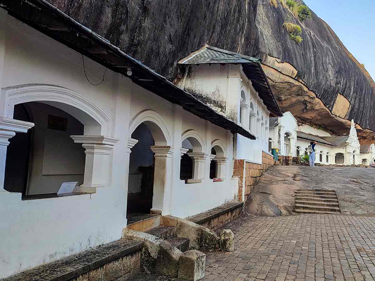 Reclining Buddha statue inside cave temple
